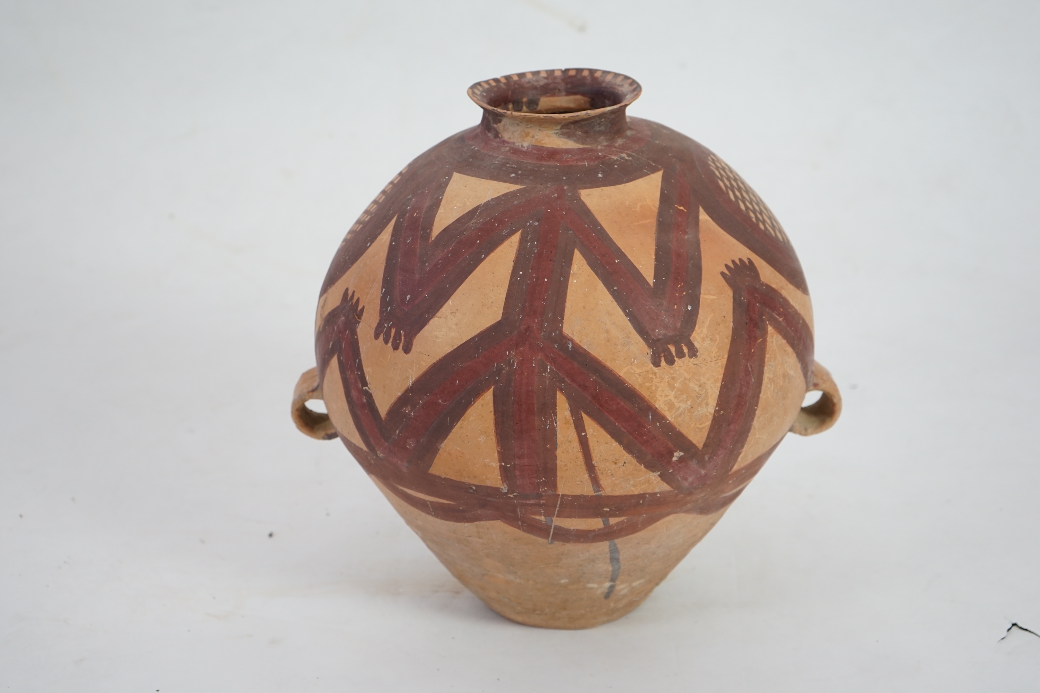 A large Chinese Neolithic Machang painted pottery jar, c.2300-2000 BC) of the Majiayao culture